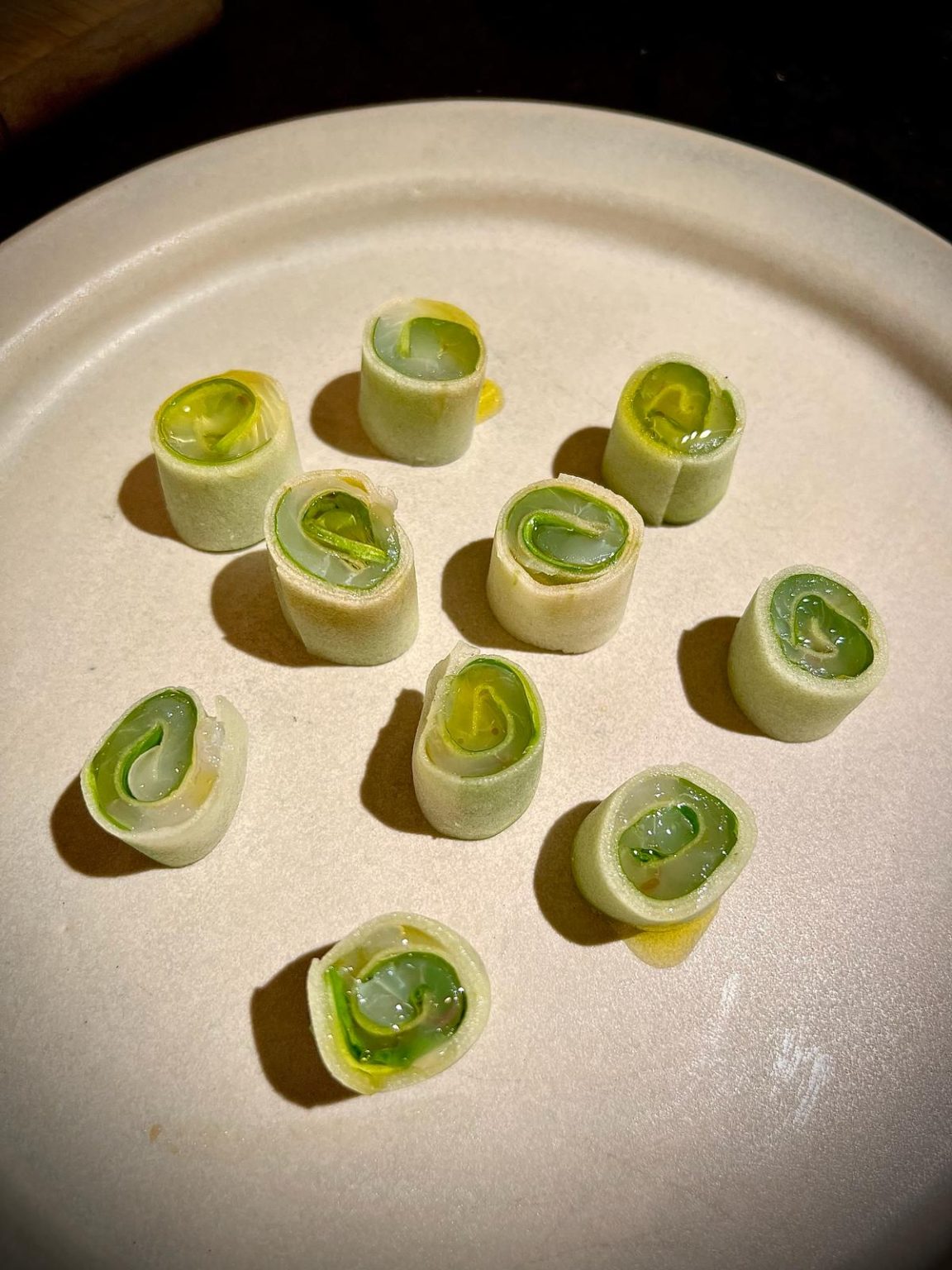 Morsels arranged in a circular pattern on a beige plate